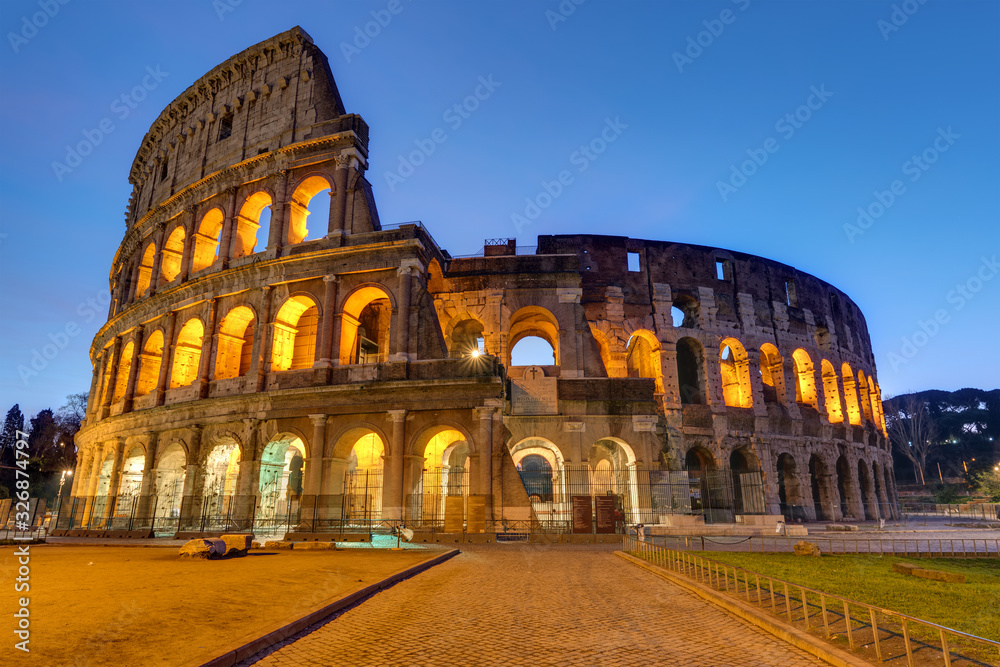 The famous Colosseum in Rome illuminated at twilight
