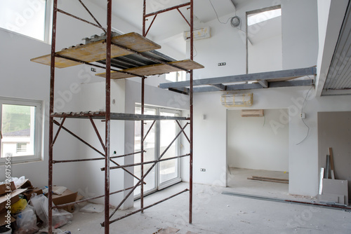 Fotografie, Obraz interior of construction site with scaffolding