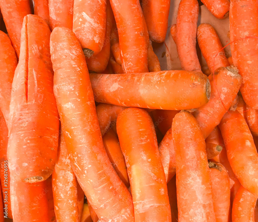 Close-Up Of Fresh Carrots. Healthy Fresh Food Background. Close-Up Of Fresh Carrots. Healthy Fresh Food Background.