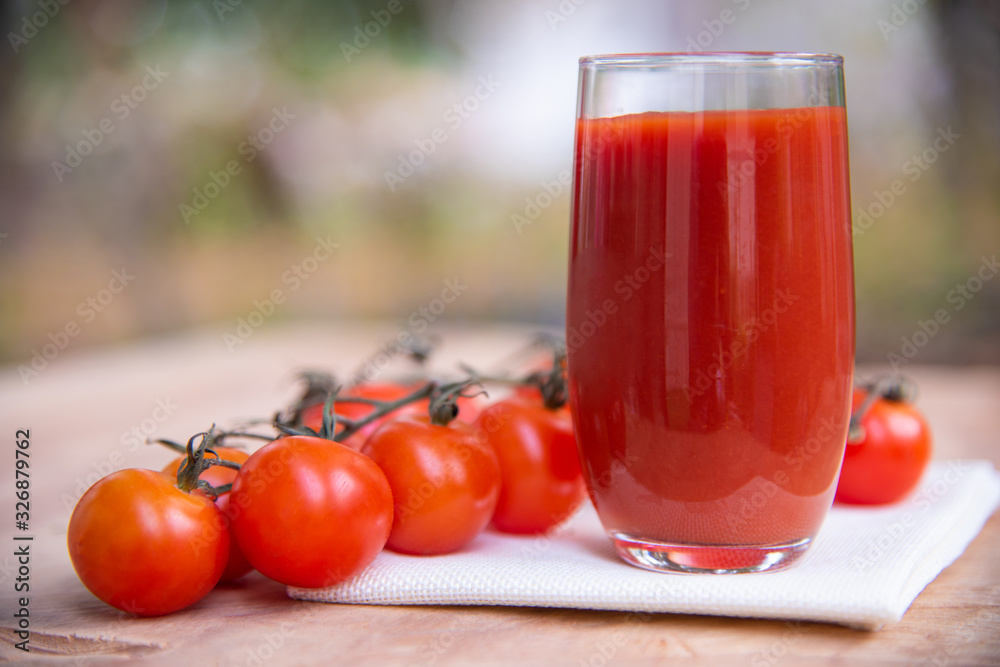 Fresh tomatoes juice in drinking healthy concept. Fresh tomatoes juice in drinking healthy concept.