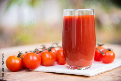 Fresh tomatoes juice in drinking healthy concept.
