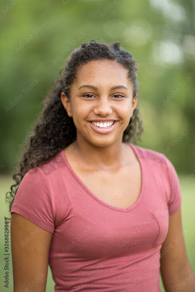 Young happy teen girl laughing and smiling. Young happy teen girl laughing and smiling.