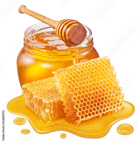 Glass pot of honey, honeycombs and sweet sticky honey puddle isolated on white background.