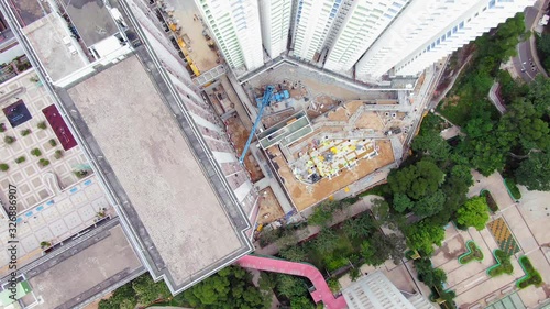 Aerial view of mega Residential towers with a construction site, in Hong Kong.