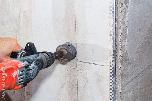 drill hole for electrical outlet outlet, special power tool drill.