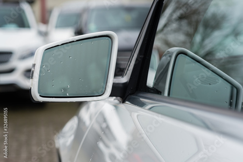 side mirror of a car outside © Dubrafoto