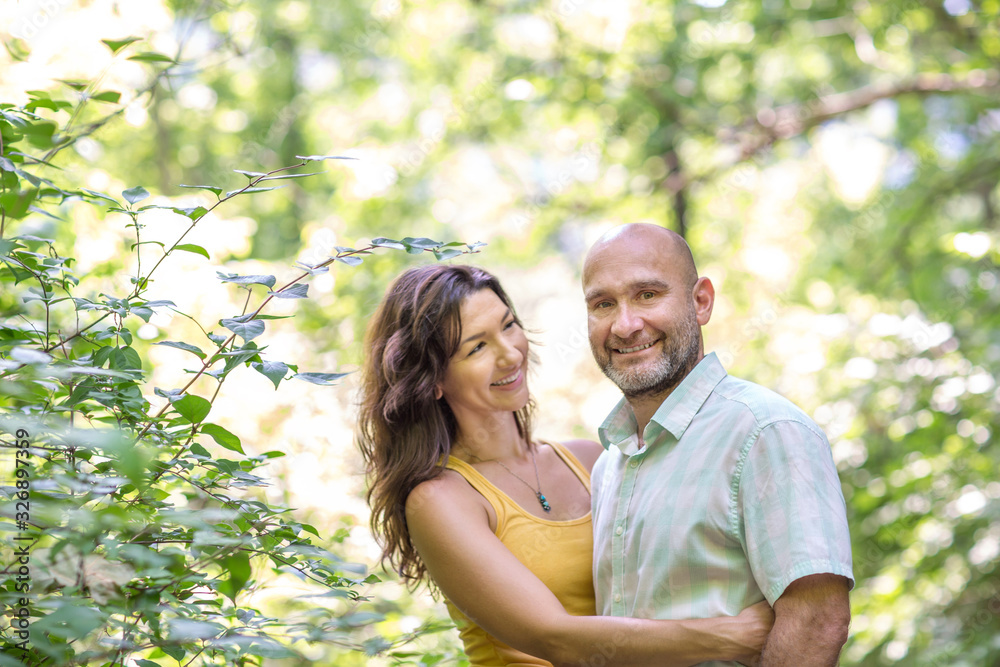 Fototapeta premium Happy mixed race couple laughing and smiling.