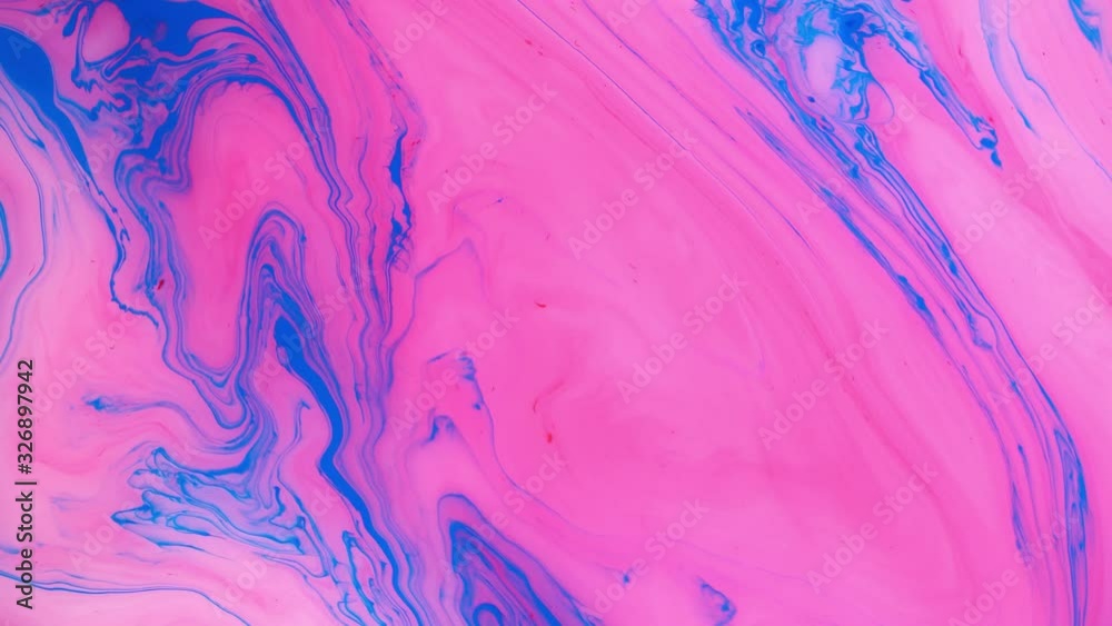 Abstract paint ink in motion. Psychedelic background footage. Flowing colorful spots. Liquid design.