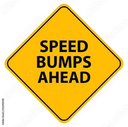 speed bumps ahead sign on white background