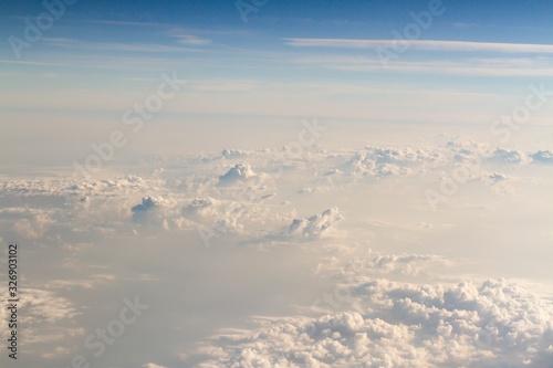 Beautiful sky background above clouds with dramatic light © Pixels Hunter