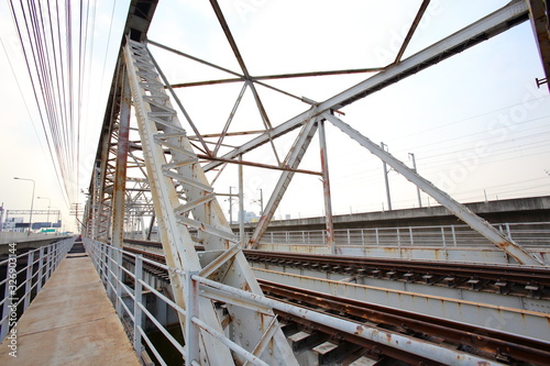 Structural steel bridge,Rama VI Bridge is a railway bridge over the Chao Phraya River in Bangkok,in Thailand,The form of a bridge in the olden days,often with steel structures.