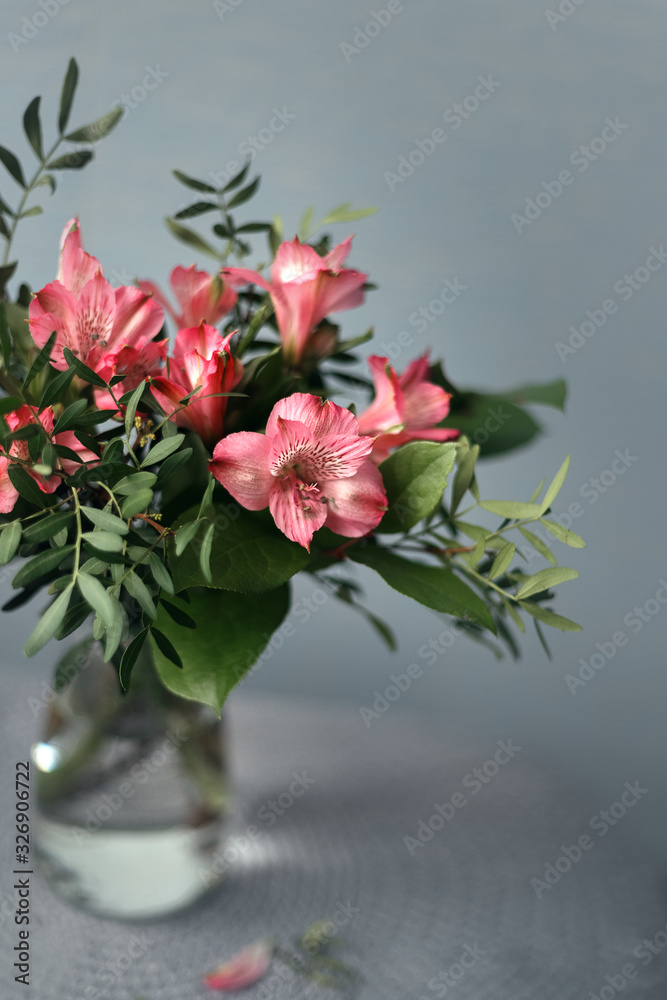 bouquet of roses in vase on black background