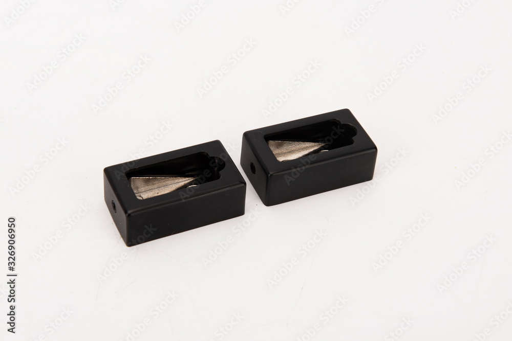 The simple silver metal deadbolt against a white background The simple silver metal deadbolt against a white background