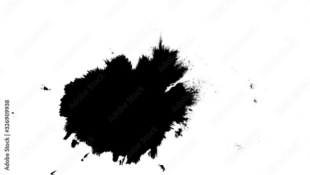 Black ink drops splatters spilling on white background