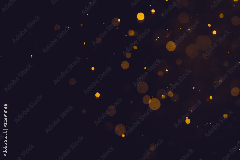 Dark Abstract Gold bokeh sparkle on black Dark Abstract Gold bokeh sparkle on black