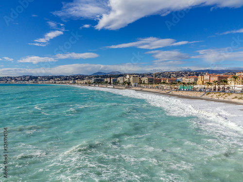 Looking across the beautiful mediterranean sea to Promenade des Anglais in Nice France