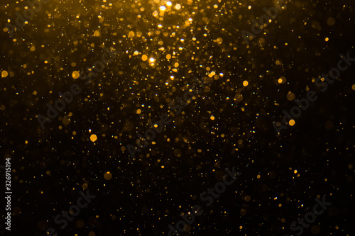 Abstract gold bokeh with black