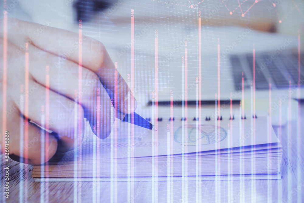 Multi exposure closeup hands with stock market forex graph. Multi exposure closeup hands with stock market forex graph.