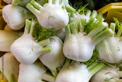 Fresh fennel bulbs at a farmers market in Italy photo