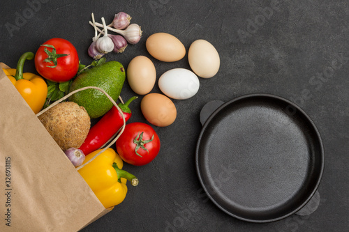 Set of products for diet food. Brown paper bag with vegetables