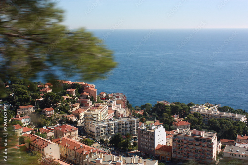 Riviera Town by the sea with horizon and blue sky in Nice, France, with copy space