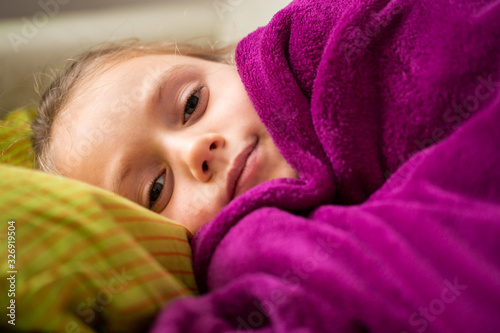 Little girl waking up from her nap