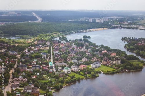 Beautiful summer panoramic landscape. Bird's-eye view of cottage village Beresta photo