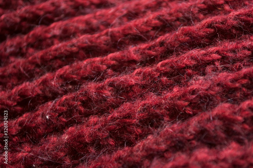 Closeup of red woolen pullover texture