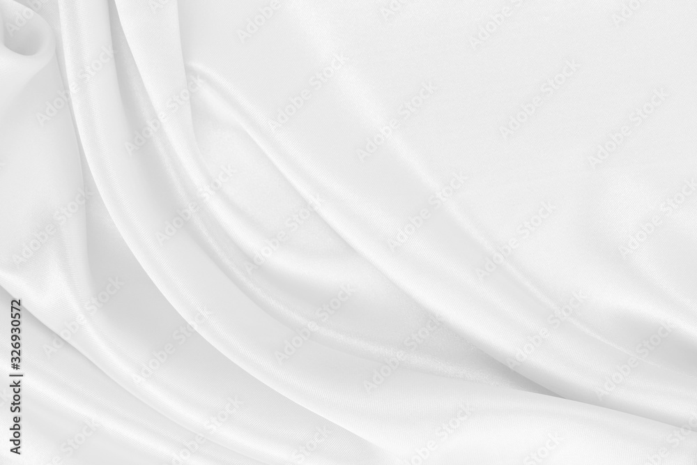 Smooth elegant white silk or satin luxury cloth texture as wedding background. Luxurious background design Smooth elegant white silk or satin luxury cloth texture as wedding background. Luxurious background design