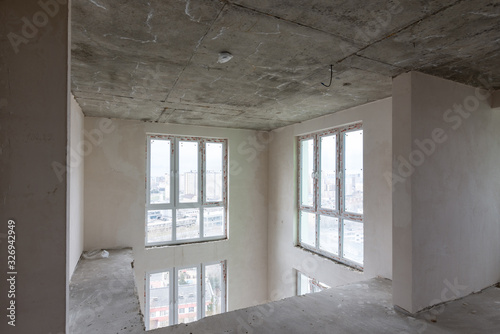 View of the windows of the second light in the apartments without repair from the developer