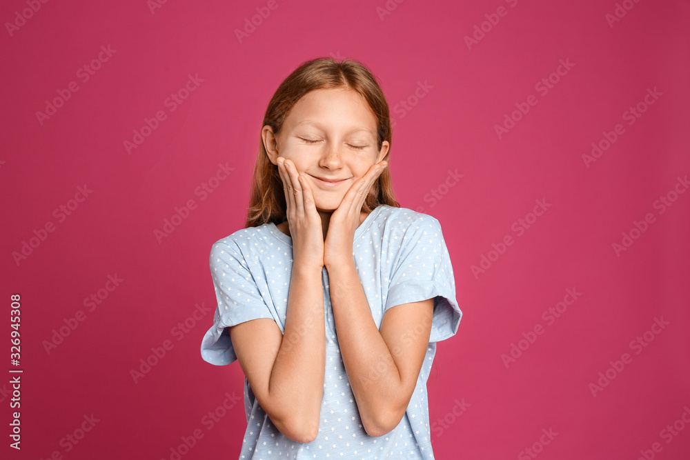 Portrait of emotional preteen girl on pink background Portrait of emotional preteen girl on pink background