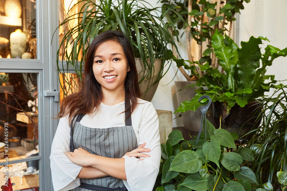 Young Asian woman as a florist in training Young Asian woman as a florist in training