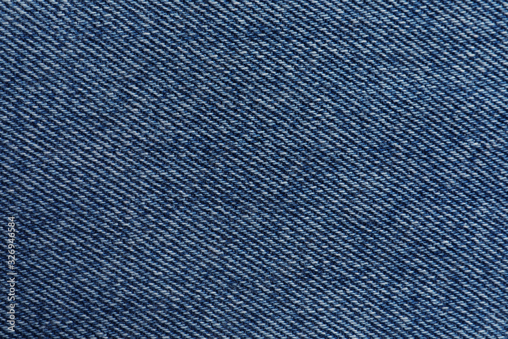 Texture of blue jeans as background, closeup Texture of blue jeans as background, closeup