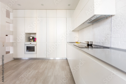 Fototapeta Naklejka Na Ścianę i Meble -  interior design of clean modern white kitchen
