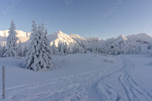 Snowy peaks of the High Tatras in the afternoon sun. © Jacek Jacobi