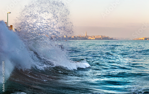 Wave crushing during high tide in Saint-Malo