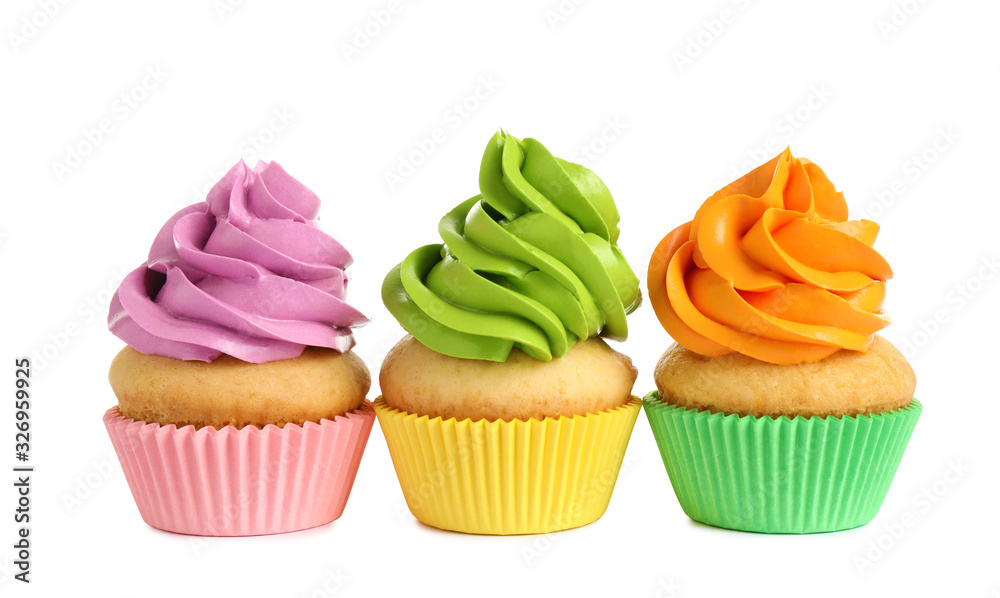 Delicious birthday cupcakes with buttercream on white background