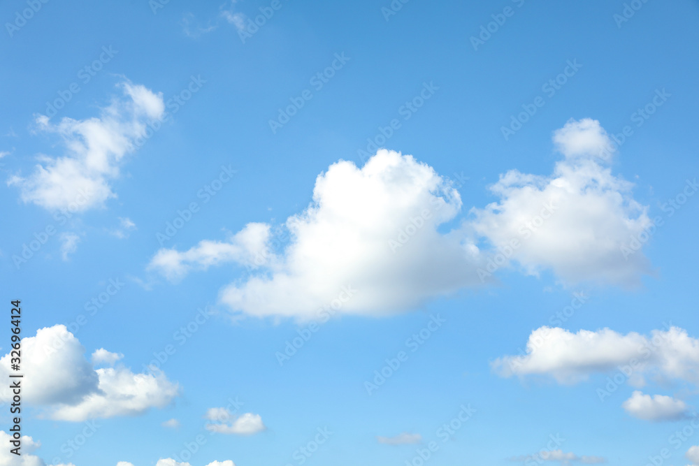 Picturesque view of blue sky with white clouds on sunny day Picturesque view of blue sky with white clouds on sunny day