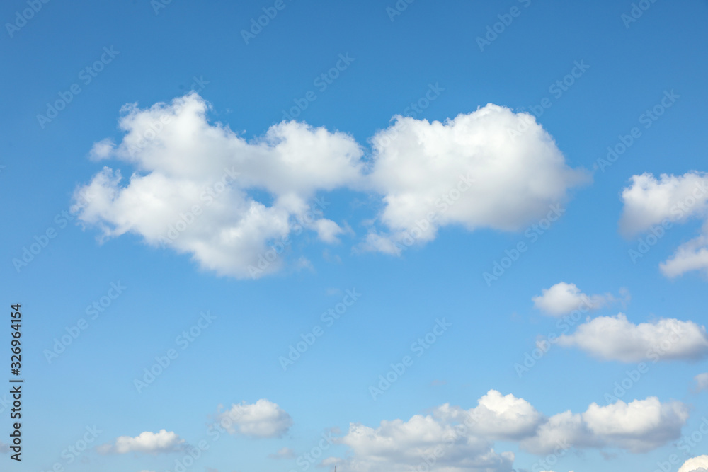Picturesque view of blue sky with white clouds on sunny day Picturesque view of blue sky with white clouds on sunny day