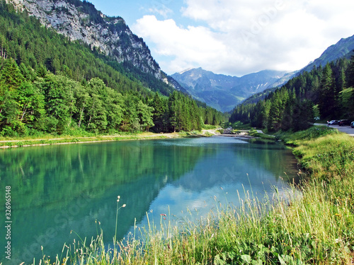 Artifical lake Gänglesee (Ganglesee or Gaenglesee) on the Valünerbach (Valunerbach or Valuenerbach) stream and in the Saminatal alpine valley - Steg, Liechtenstein photo