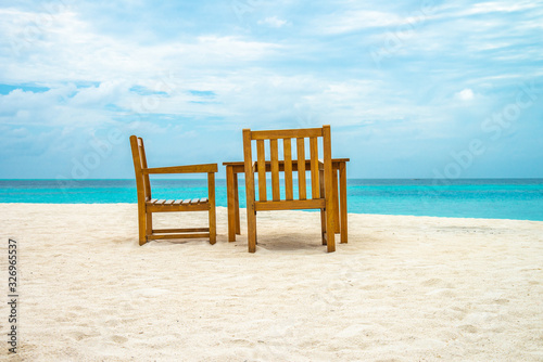 Breakfast table on beach in the Maldives