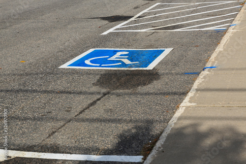 Blue marked parking for disabled, Huntsville, Ontario, Canada © Manfred Schmidt