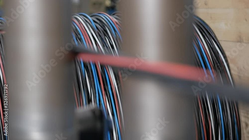 Plant for the production of the cable. Covering the copper cable with a sheath.