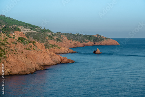 ESTEREL, FRANCE - JANUARY 1, 2020: Estetel - coastal mountain range in Mediterranean between Saint Raphael and Cannes on the french riviera. Volcanic origin, composed mostly of red colored porphyry. photo