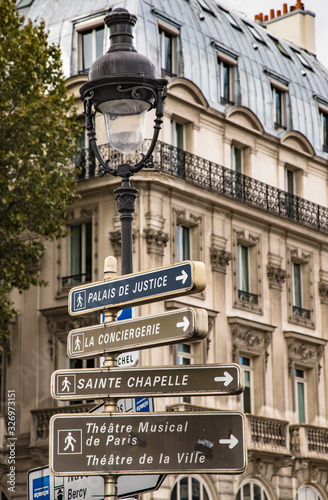 Paris, France - 28th September, 2019: Direction signs for tourist attractions in central Paris.