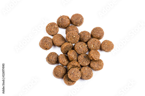 Dry cat food isolated on white background close-up top view