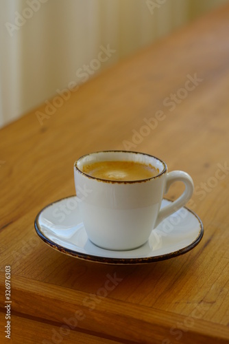 A cup of warm espresso coffee