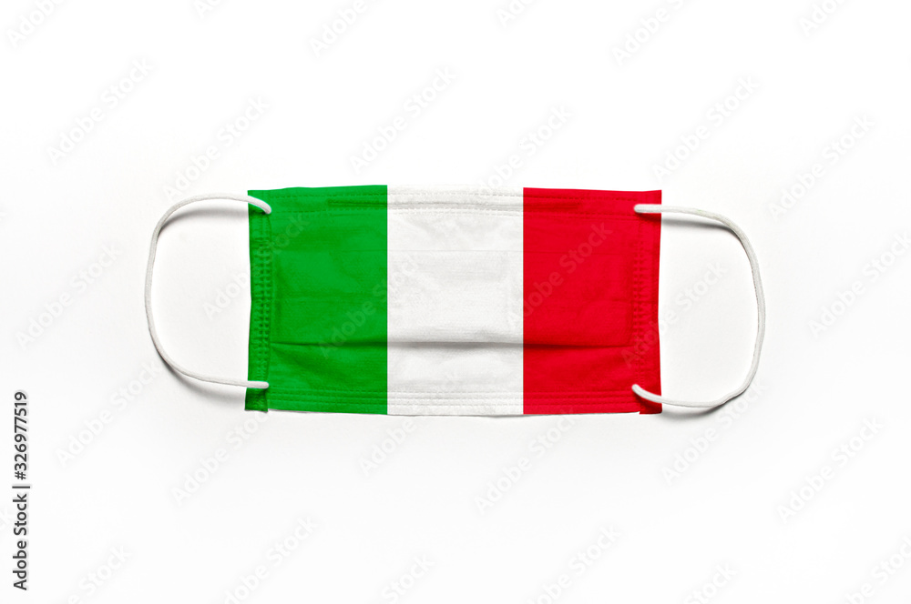 Medical mask in color of the flag of Italy on white background flat lay