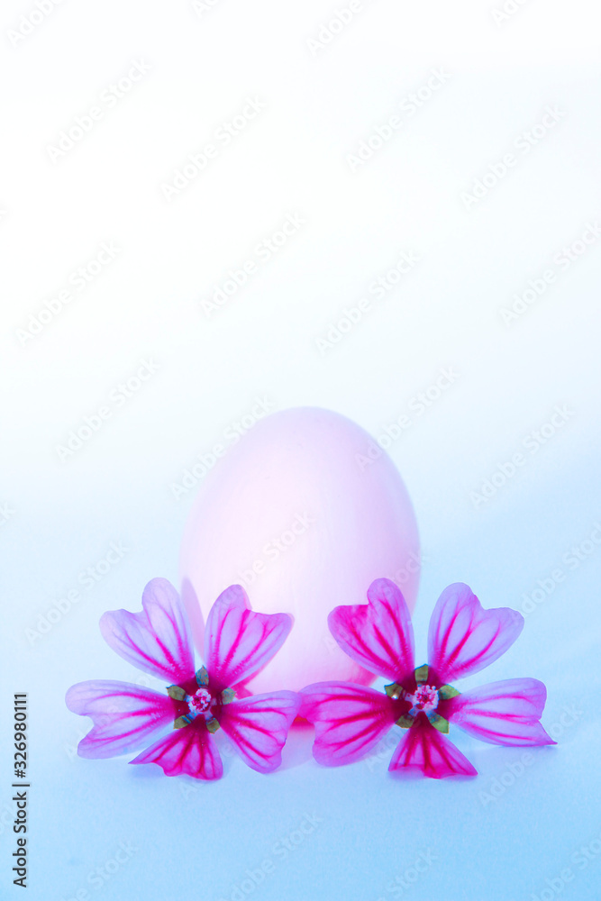 decorative card with the image of pink eggs and pink flowers for Easter