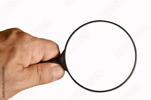 magnifying glass in hand isolated on white background